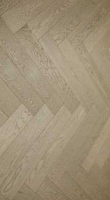 Engineered Wood A.W.O. Herringbone Character Sky 5 in 18.19 SF Box.